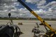 Airmen from the 726th Air Mobility Squadron, 52nd Civil Engineer Squadron Dirt Boyz and 721st Aircraft Maintenance Squadron work together to replace part of an engine on a C-17 Globemaster III at Spangdahlem Air Base, Germany, Aug. 9, 2017.  The 726th AMS enables the delivery of war-fighting and humanitarian effects through rapid global air mobility. (U.S. Air Force photo by Staff Sgt. Jonathan Snyder)