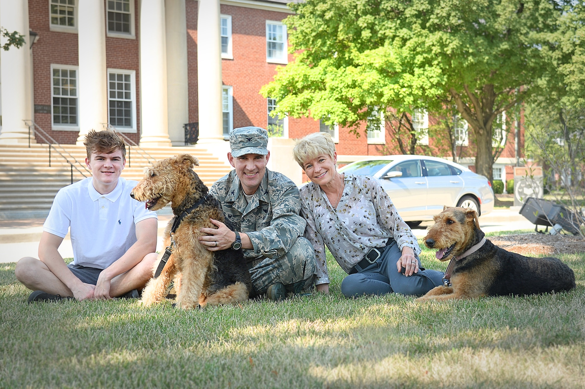 Pictured is the Howard family: Col. John Howard and wife, Dana, along with son, Kevin, and their dogs, Lucky and Cali. Their daughter, Emily, is not pictured.

(Photo by Karen Petitt)