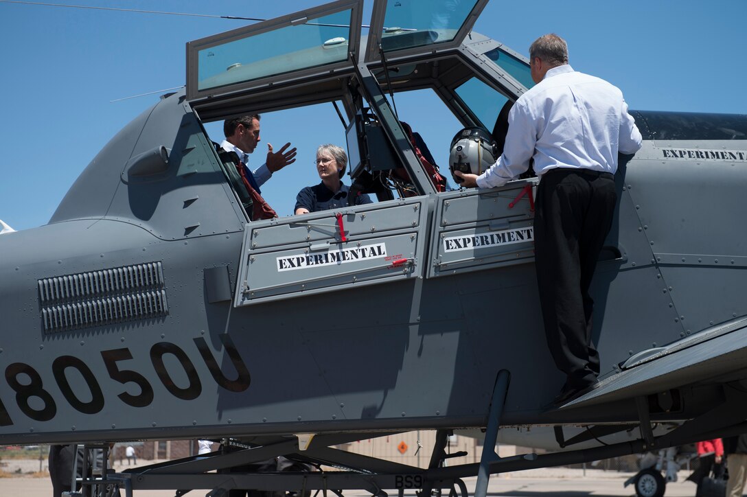 Secretary of the Air Force Heather Wilson meets with members from the Light Attack Experiment at Holloman Air Force Base, N.M., Aug. 9, 2017. Wilson had an immersion tour of Holloman and is here for a live-fly experiment with off-the-shelf aircraft. The Air Force is pursuing a Light Attack Capabilities Experimentation Campaign, which has grown out of our Close Air Support Experimentation Campaign. The Campaign is being led by the Air Force Strategic Development Planning and Experimentation Office under Air Force Materiel Command. (U.S. Air Force Airman 1st Class Alexis Docherty)