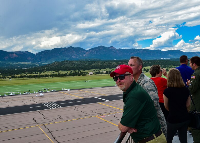 Senator Sean O'brien, Ohio State Senator for the 32nd District, enjoys a view from the U.S. Air Force Academy's control tower overlooking the Rocky Mountains July 28, 2017. For many cadets the classroom is an airfield and the open sky.