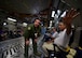 Tech. Sgt. Scott Schaffner, a loadmaster from the 89th AS, answers a question of a YARS civic leader July 28, 2017, aboard a C-17 on a flight to Colorado.