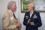 Brig. Gen. Heather Pringle, 502nd Air Base Wing and Joint Base San Antonio commander, speaks with John Williams, Universal City mayor, prior to the presentation of the Altus Trophy at the San Antonio Chamber of Commerce Aug. 8, 2017.