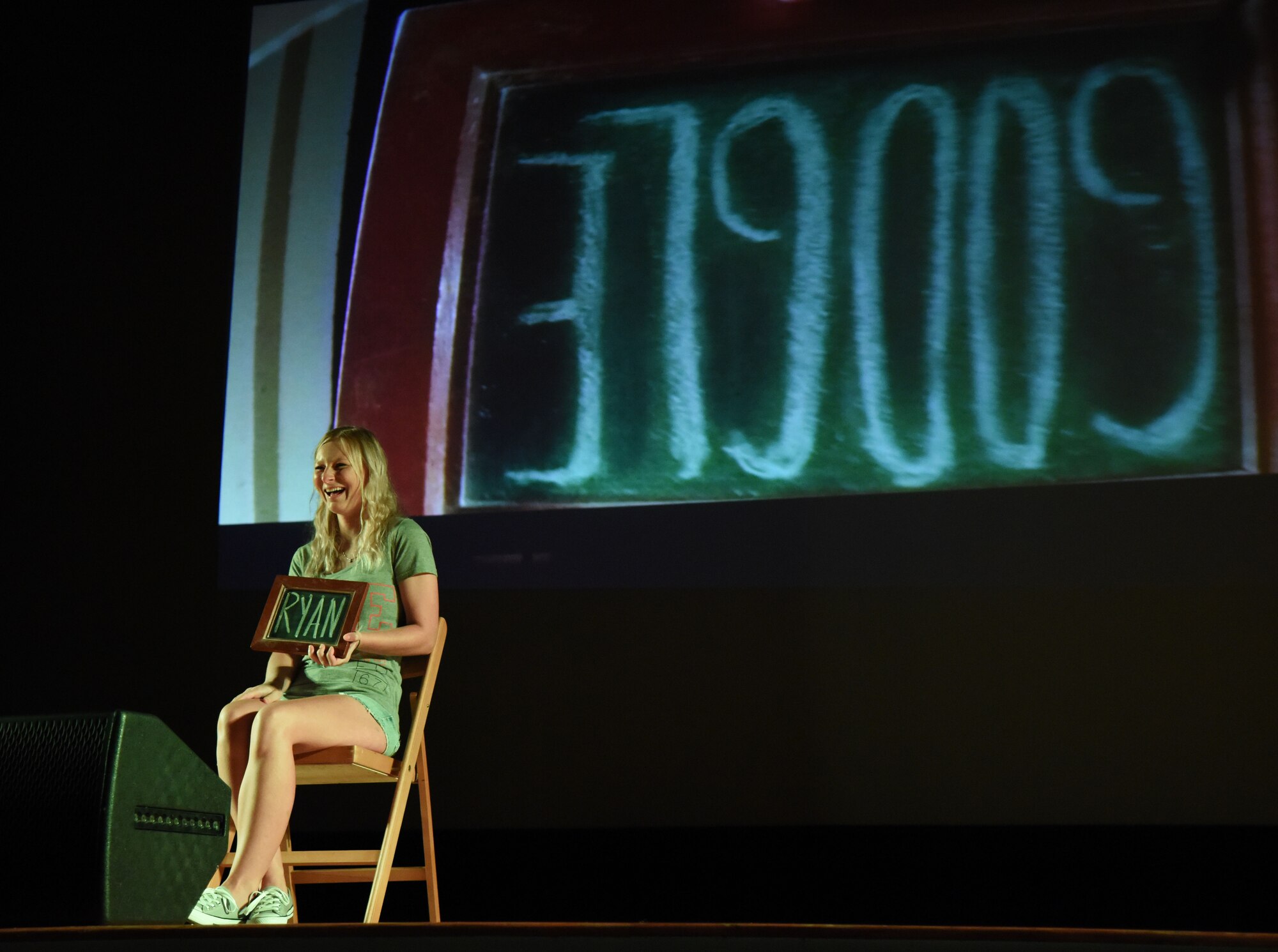 Heather Fitzgerald, wife of Staff Sgt. Ryan Fitzgerald, 81st Logistics Readiness Squadron vehicle maintenance technician, participates in an illusion during the Mike Super’s Magic & Illusion show at the Welch Theater July 29, 2017, on Keesler Air Force Base, Miss. Super, an American magician who is the winner of the NBC show Phenomenon, is currently touring the U.S. and Canada with his illusion show. (U.S. Air Force photo by Kemberly Groue)