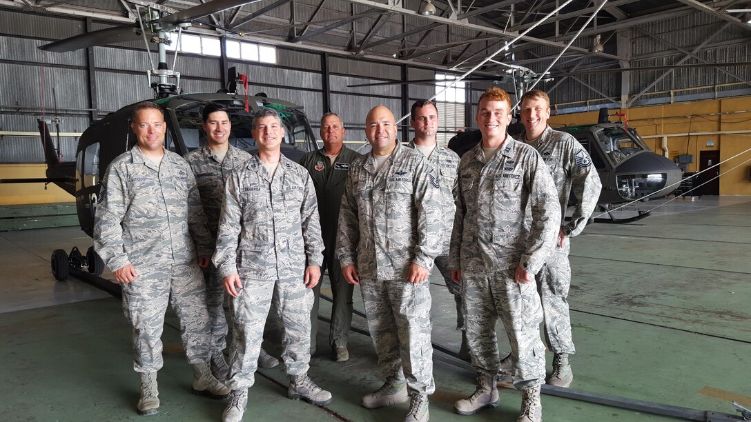 A group photo of 571st Mobility Support Advisory Squadron air advisors taken at the Belize Defense Force Air Wing. (Courtesy Photo)