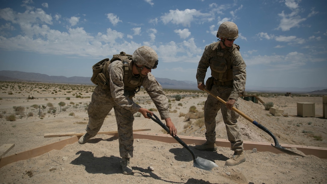 Marines with the engineer platoon for Marine Wing Support Squadron 272, construct an observation post aboard the Combat Center during Integrated Training Exercise 5-17, July 29, 2017. MWSS-272 is supporting the Aviation Combat Element of the ITX. The ACE conducts offensive, defensive, and all other air operations to support the MAGTF mission .