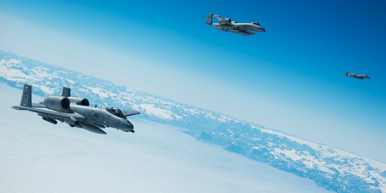 Three 175th Wing Maryland Air National Guard A-10C Thunderbolt IIs fly off the southern coast of Greenland while en route to Iceland Aug. 3, 2017.