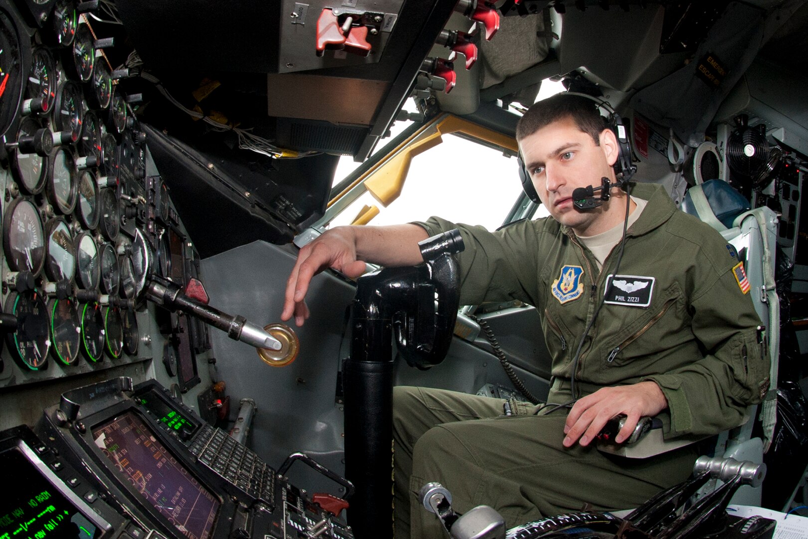 Captain Phil Zizzi conducts pre-flight checks inside a 459th Air Refueling Wing KC-135R Stratotanker on the Keflavík International Airport, Iceland.
