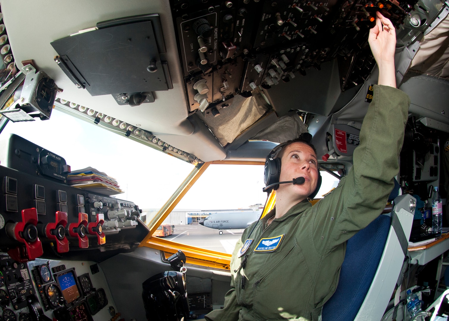 A pilot performs pre-flight checks prior to takeoff from Estonia.