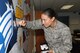 Second Lt. Jessica Serd, 78th Logistics Readiness Squadron Vehicle Operations officer in charge, retouches the graphic of an Eagle at the Staff Sgt. Felicia R. Rivers Airman Leadership School. Serd was one of many volunteers who rolled up their sleeves and helped renovate the school. (U.S. Air Force photo/MISUZU ALLEN)