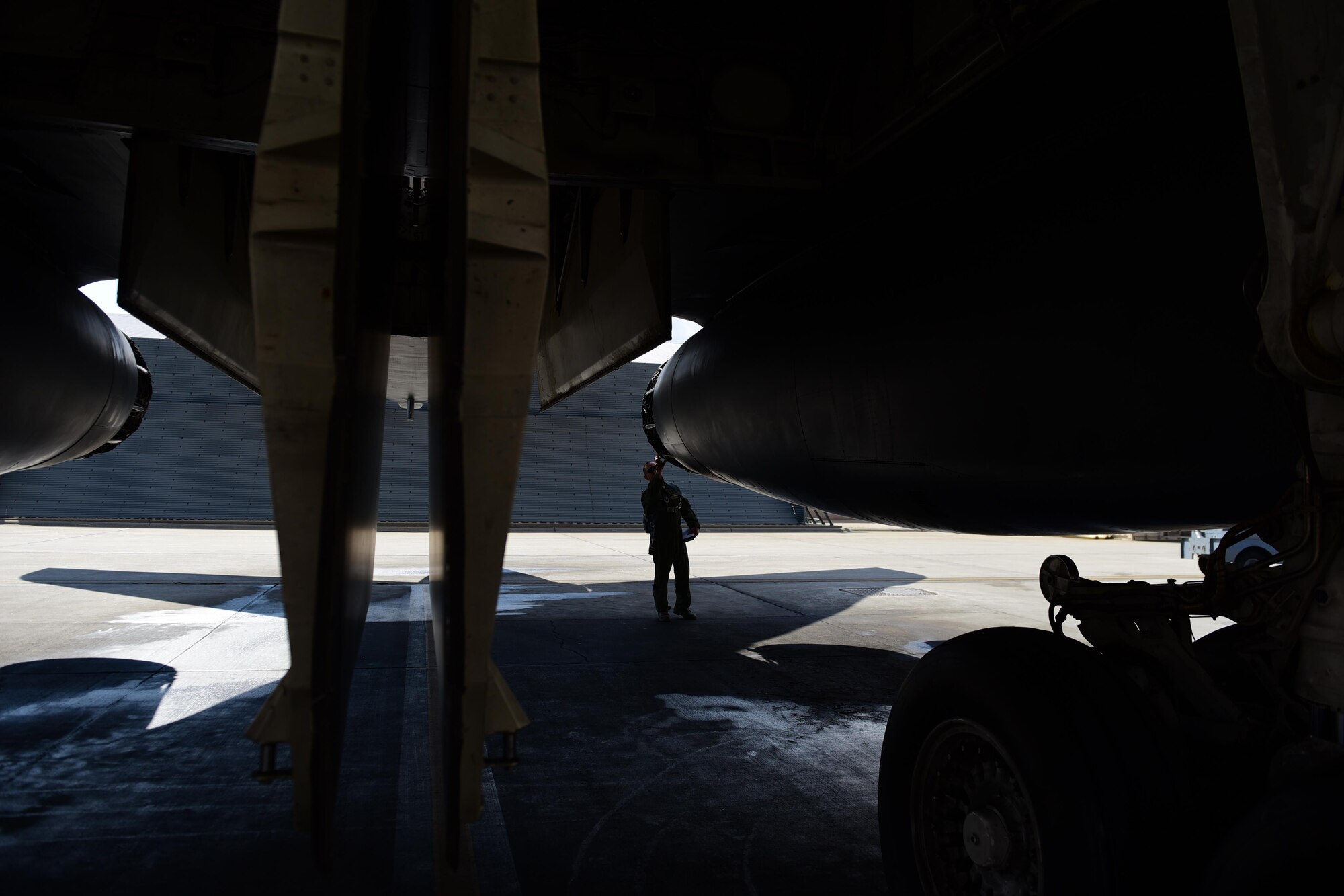 Col. Gentry W. Boswell, former 28th Bomb Wing commander, inspects a b-1 bomber before launch at Ellsworth Air Force Base