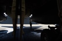 Col. Gentry W. Boswell, former 28th Bomb Wing commander, inspects a b-1 bomber before launch at Ellsworth Air Force Base, S.D., Aug. 7, 2017. Boswell flew four hours during his final flight as commander of the 28th Bomb Wing. (U.S. Air Force photo by Senior Airman James L. Miller)