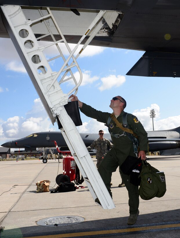 Col. Gentry W. Boswell, former 28th Bomb Wing commander, boards a B-1 bomber for the last time as commander of the 28th Bomb Wing at Ellsworth Air Force Base