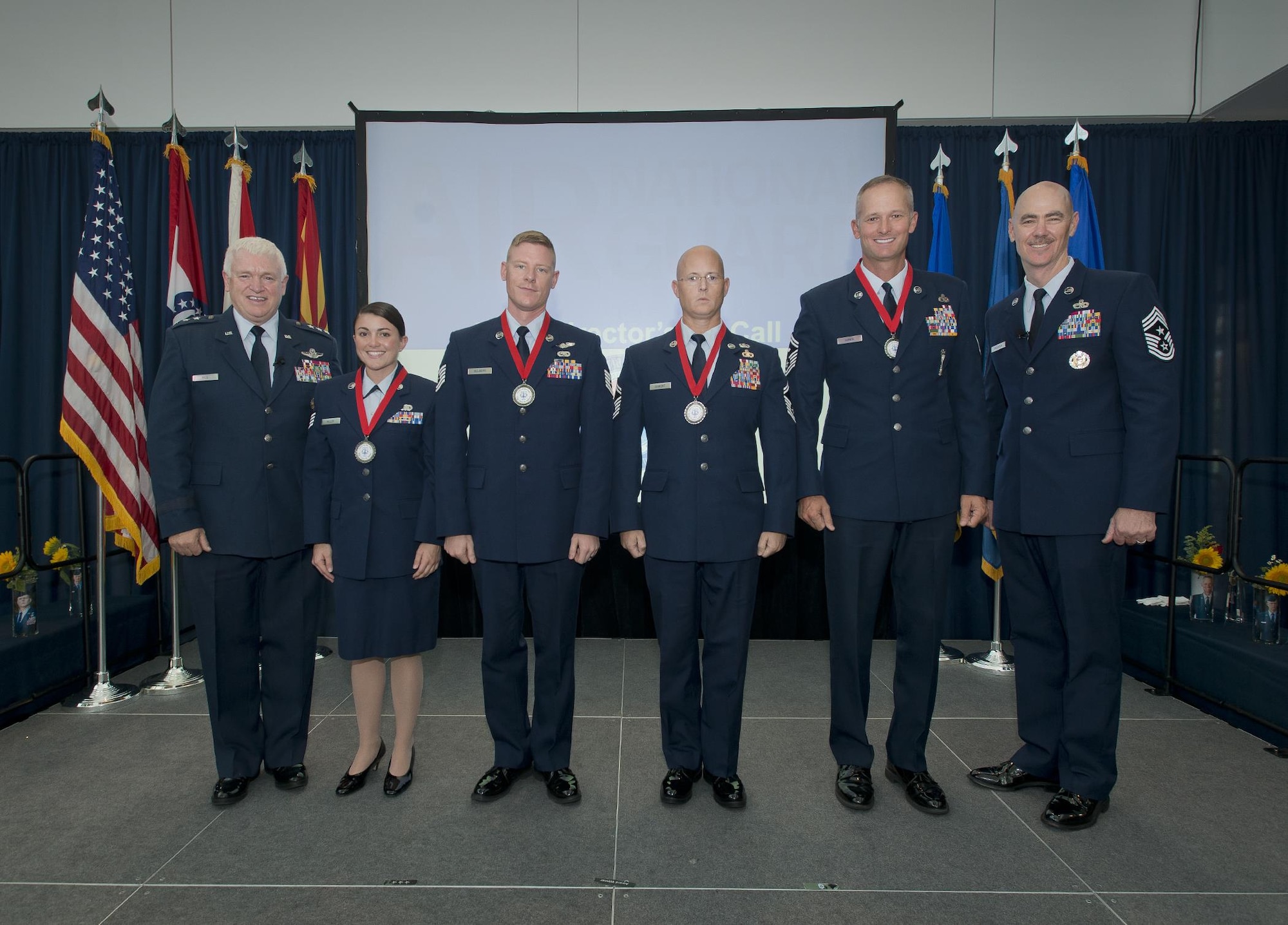 Lt. Gen. L. Scott Rice, director of the Air National Guard and Chief Master Sgt. Ronald C. Anderson, the command chief master sergeant of the ANG, pose for a photo with the ANG Outstanding Airmen of the Year during the Focus on the Force Week All Call. The OAY winners are (left to right) Staff Sgt. Lacey K. Miller, Airman of the Year; Tech. Sgt. Sgt. Jason D. Selberg, Non-Commissioned Officer of the Year; Senior Master Sgt. Thomas J. DuMont, Senior Non-Commissioned Officer of the Year; and Senior Master Sgt. Jason L. Handa, First Sergeant of the Year. (U.S. Air National Guard photo by Master. Sgt. Marvin R. Preston)