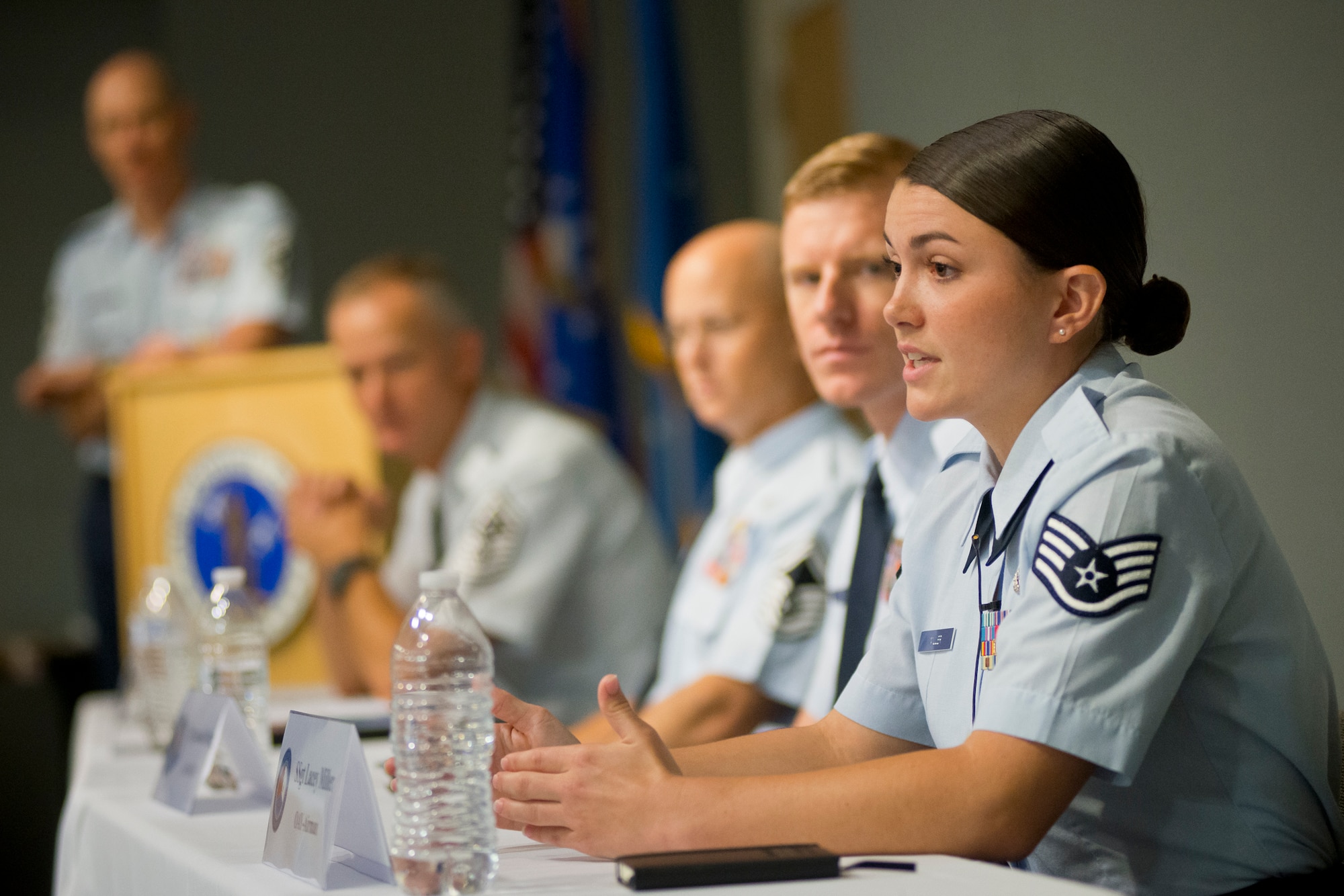 Staff Sgt. Lacey K. Miller, the Air National Guard Outstanding Airman of the Year, responds to a question during a panel discussion at the Chiefs' Executive Course. The panel was 
 part of Focus on the Force Week, a series of events highlighting the importance of professional development for Airmen at all levels, and the recognition of accomplishments throughout the enlisted corps. (U.S. Air National Guard photo by Master Sgt. Marvin R. Preston)