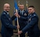 Lt. Col. Wayne Johnson, deputy commander for the 932nd Mission Support Group receives the Logistic Readiness Flight guidon from Maj. Christopher Kaighen Aug. 5, 2017, Scott Air Force Base, Illinois during a change of command ceremony.  Kaighen relinquished command of the 932nd LRF and will take on a new role as 22 AF/A4R Chief, Logistics Readiness Division. (U.S. Air Force photo by Tech. Sgt. Christopher Parr)