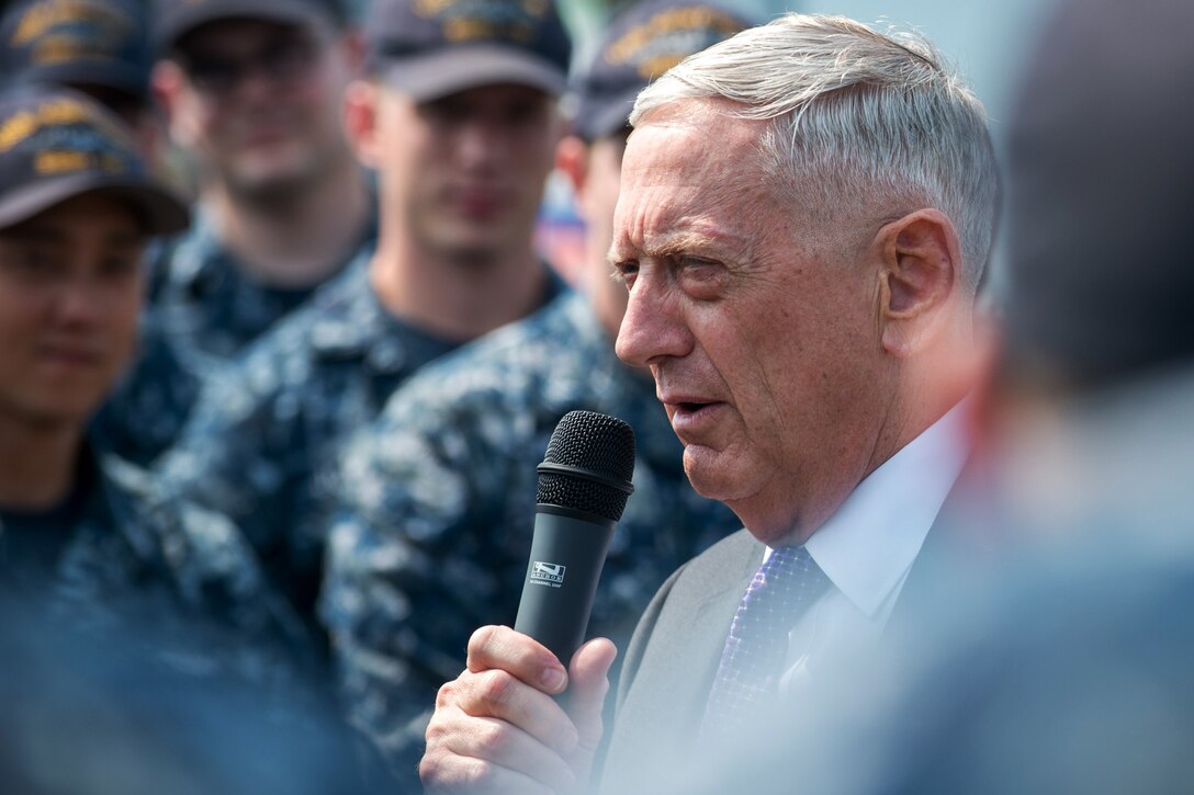 Secretary speaks to sailors from USS Kentucky.