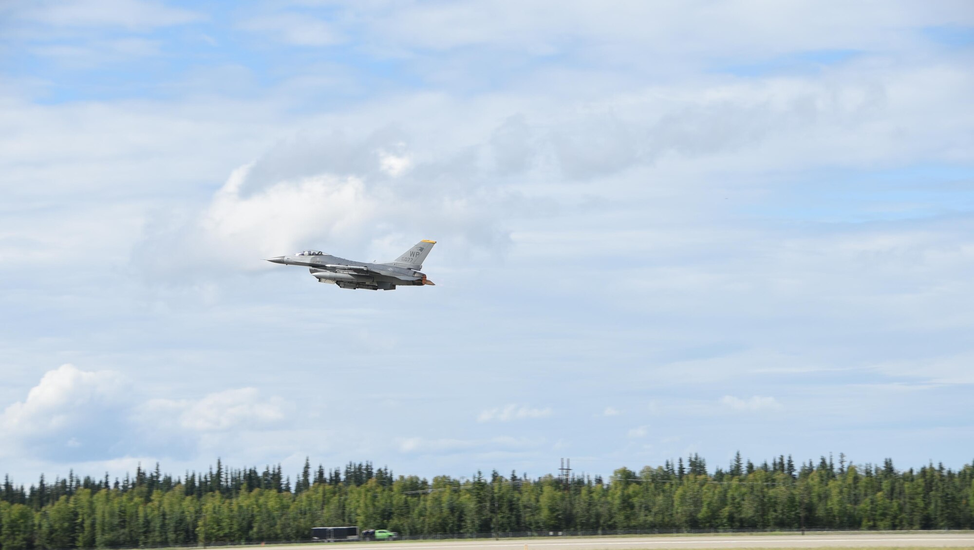 A U.S. Air Force F-16 Fighting Falcon assigned to the 80th Fighter Squadron, Kunsan Air Base, Republic of Korea, takes off from the runway during Red Flag-Alaska at Eielson Air Force Base, Alaska, Aug. 2, 2017. RF-A is a Pacific Air Forces-sponsored, Joint National Training Capability exercise designed to allow pilots to experience real-life scenarios they may encounter. (U.S. Air Force photo by Staff Sgt. Joshua Rosales)