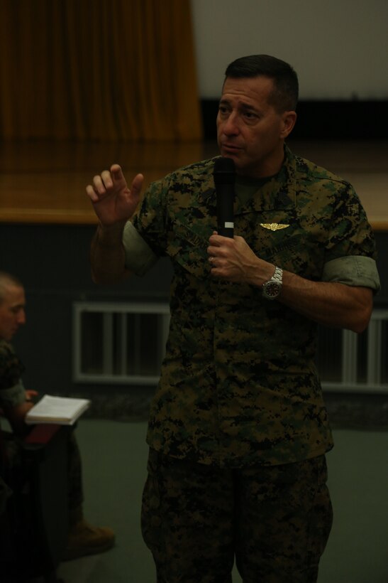 Sgt. Maj. Anthony Spadaro speaks in a briefing to service members Aug. 10 in the base theater aboard Camp Foster, Okinawa, Japan.