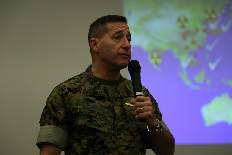 Sgt. Maj. Anthony Spadaro speaks in a briefing to service members Aug. 10 in the base theater aboard Camp Foster, Okinawa, Japan.