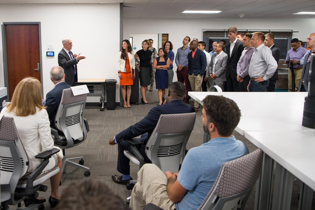 Defense Secretary Jim Mattis speaks with members of the Defense Innovation Unit Experimental