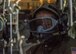 Tech. Sgt. Katherine Henson, 94th Aeromedical Evacuation Squadron flight medic, dons a firefighting mask and prepares to fight a simulated fire aboard a C-130H Hercules July 30, 2017. In case of a fire onboard the aircraft, one flight medic will fight the fire, while the other medics move patients. (U.S. Air Force photo/Staff Sgt. Andrew Park)