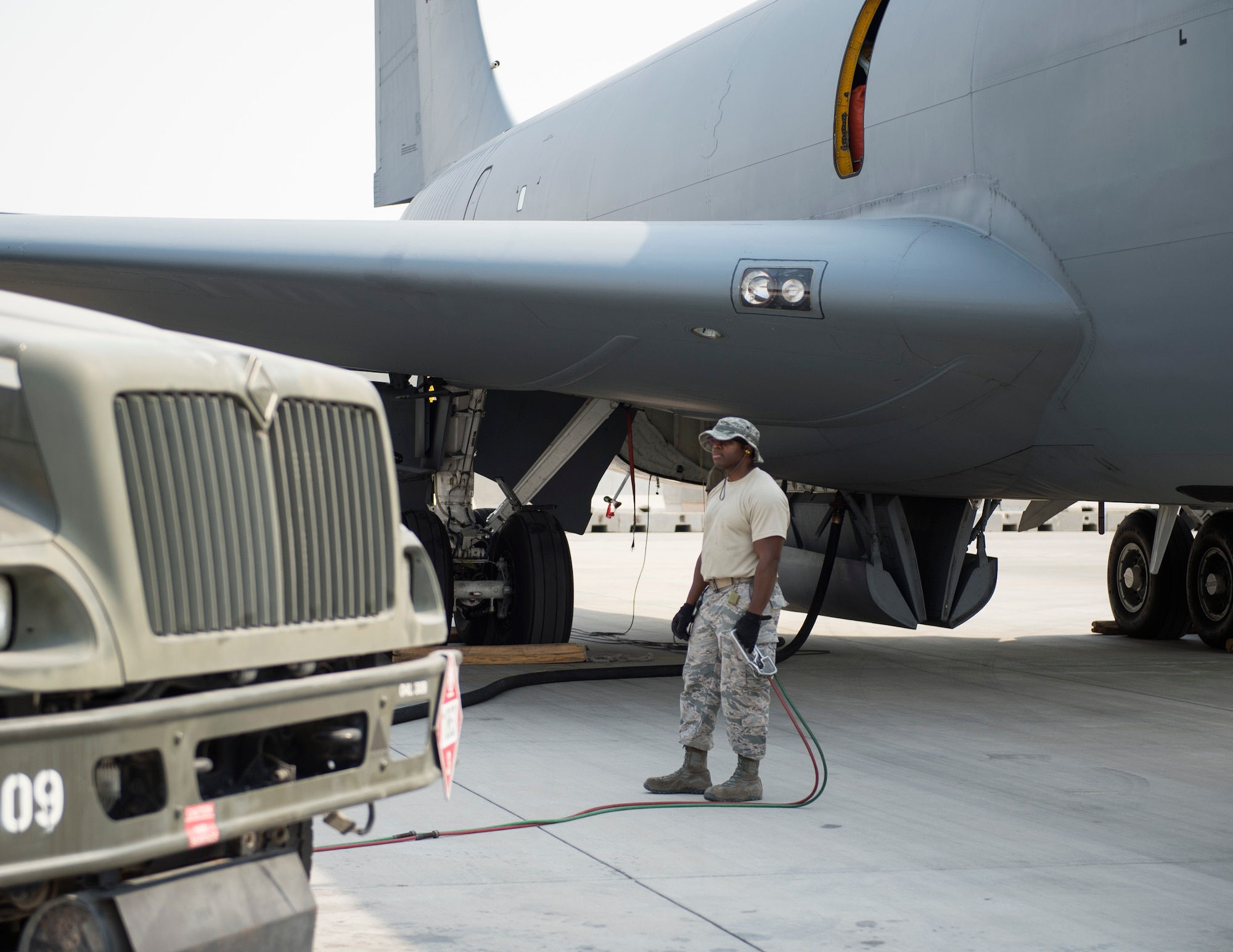 U.S Air Force Tech. Sgt. Jason Johnson, a fuels specialist with the 379th Expeditionary Logistics Readiness Squadron, Fuels Management Flight, monitors the fuel flow at Al Udeid Air Base, Qatar, July 24, 2017.