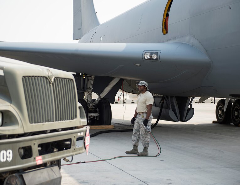 U.S Air Force Tech. Sgt. Jason Johnson, a fuels specialist with the 379th Expeditionary Logistics Readiness Squadron Fuels Management Flight, monitors the fuel flow at Al Udeid Air Base, Qatar, July 24, 2017. As a fuels specialist, Johnson is responsible for operating the vehicle, equipment and storage facilities that are vital to the refueling process and ensuring that all safety regulations are being followed.  (U.S. Air Force photo by Tech. Sgt. Amy M. Lovgren)