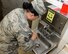 U.S. Air Force Technical Sgt. Alina Ness, non-commissioned officer of food safety and sanitation assigned to the Public Health Element of the 379th Expeditionary Medical Group, washes her hands during an inspection of a dining facility at Al Udeid, Air Base, Qatar, July 22, 2017. The members of the 379th EMDG/SGOL work behind the scenes to help keep Airmen deployed here healthy by inspecting public facilities, ensuring the medical readiness of forward deploying Airmen and by tracking and working to prevent the spread of communicable diseases. (U.S. Air National Guard photo by Tech. Sgt. Bradly A. Schneider/Released)