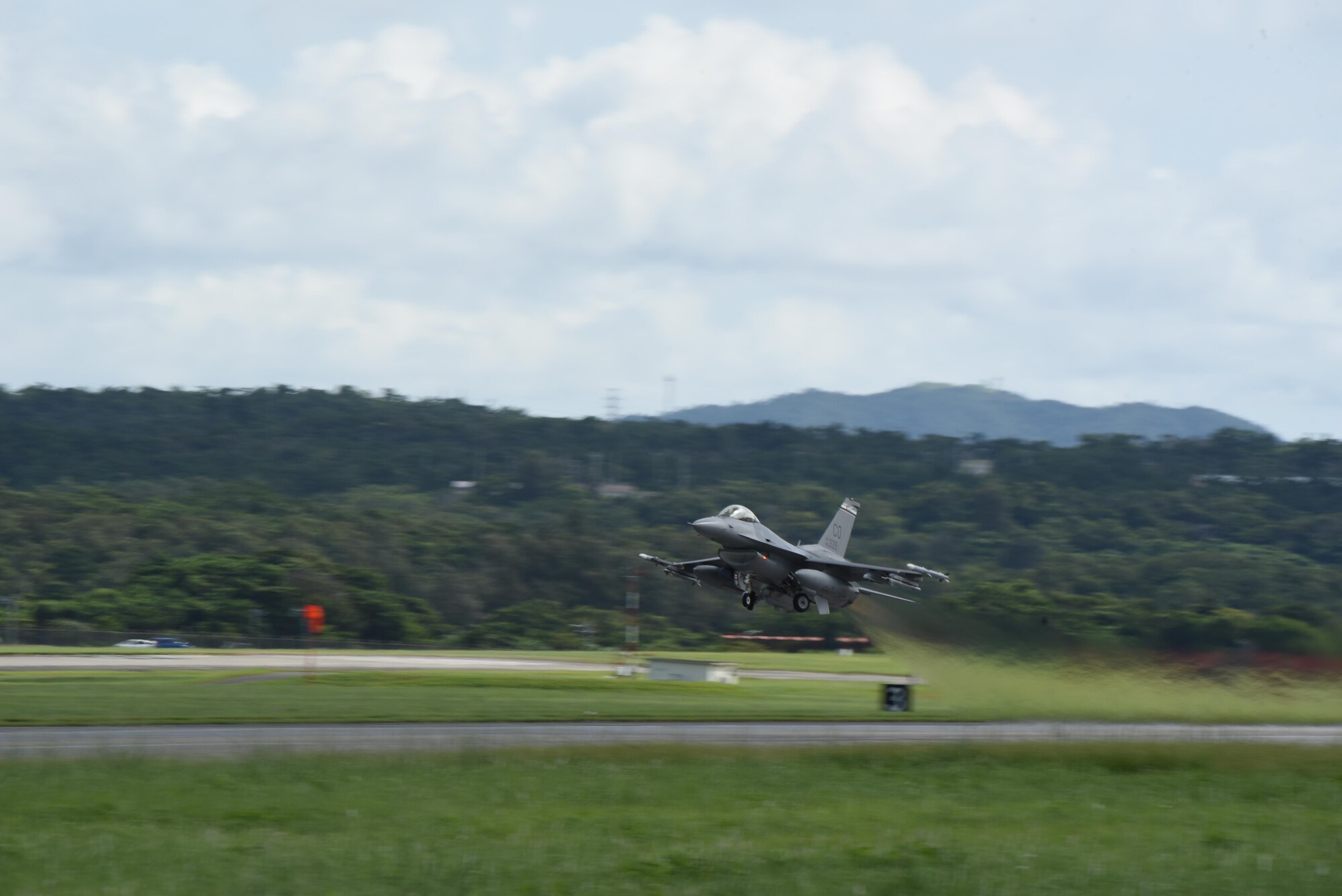 An F-16 aircraft taking off from Kadena Air Base