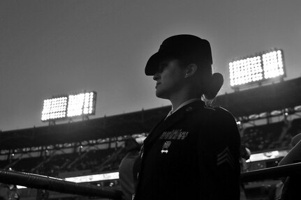 Sgt. Maribel Cano-Meraz, assigned to the 85th Support Command headquartered in Arlington Heights, Illinois, walks onto Guaranteed Rate Field during the Chicago White Sox vs. Houston Astros game for a ‘Hero of the Game’ military recognition there.