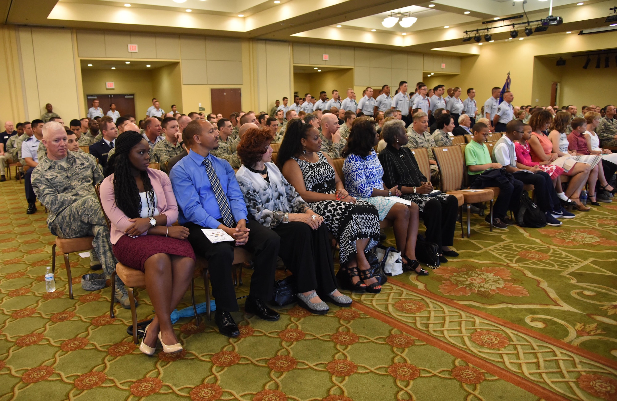 Keesler personnel, families and friends attend the 81st Training Group change of command ceremony in the Bay Breeze Event Center Aug. 4, 2017, on Keesler Air Force Base, Miss. The ceremony is a symbol of command being exchanged from one commander to the next by the hand off of a ceremonial guidon. Col. Scott Solomon passed on command of the 81st TRG to Col. Leo Lawson, Jr. (U.S. Air Force photo by Kemberly Groue)