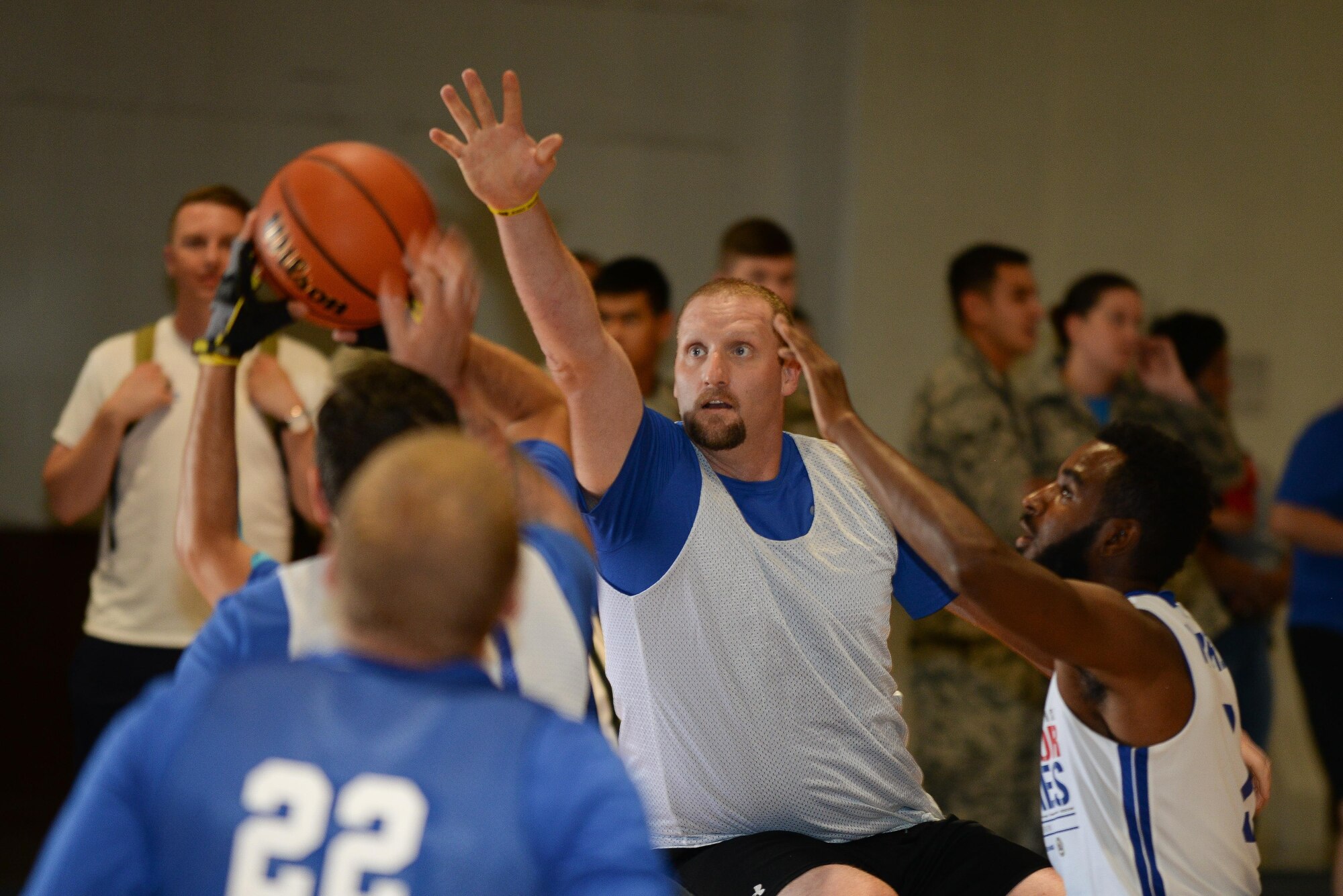 Tech. Sgt. (Ret.) Ben Clark, a warrior with the Air Force Wounded Warrior CARE Event at Offutt Air Force Base, Nebraska, competes in wheelchair basketball at the Offutt Field House Aug. 4, 2017. Clark was medically retired from the Air Force due to injuries sustained in a 2009 deployment to Iraq.