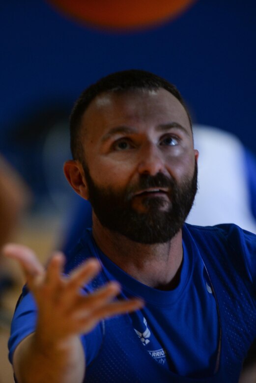 First Lt. (Ret.) Casey Dockins, a warrior with the Air Force Wounded Warrior CARE Event at Offutt Air Force Base, Nebraska, competes in wheelchair basketball at the Offutt Field House Aug. 4, 2017. Dockins was medically retired from the Air Force after years of hiding injuries sustained in a 2008 deployment to Iraq.