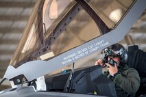 F-35A Lightning II Pilot Maj. James Schmidt, 388th Operations Group, prepares for flight Aug. 7 at Hill Air Force Base. F-35s were participating in the Weapons System Evaluation Program, or WSEP, for the first time as the jets continue toward Full Warfighting Capability. (Paul Holcomb/U.S. Air Force)
