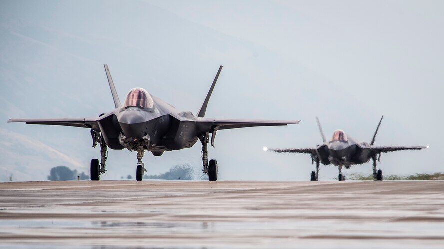 F-35A Lightning II aircraft from Hill Air Force Base, Utah, proceed down the taxiway at the base, Aug. 8. The F-35s flew Combat Hammer, an evaluation exercise which tests and validates the performance of crews, pilots, and their technology while deploying precision-guided munitions. (Paul Holcomb/U.S. Air Force)