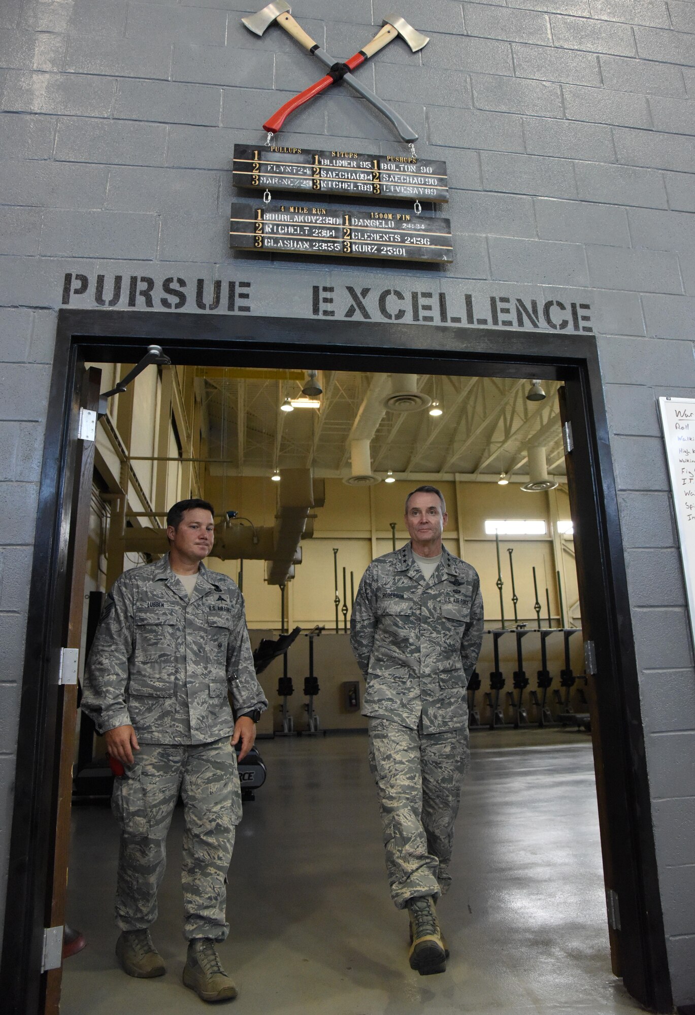 Master Sgt. Richard Lubben, 352nd Battlefield Airmen Training Squadron superintendent, walks with Lt. Gen. Darryl Roberson, commander of Air Education and Training Command, during a tour of the fitness center at Matero Hall July 19, 2017, at Keesler Air Force Base, Miss. (U.S. Air Force photo by Kemberly Groue)