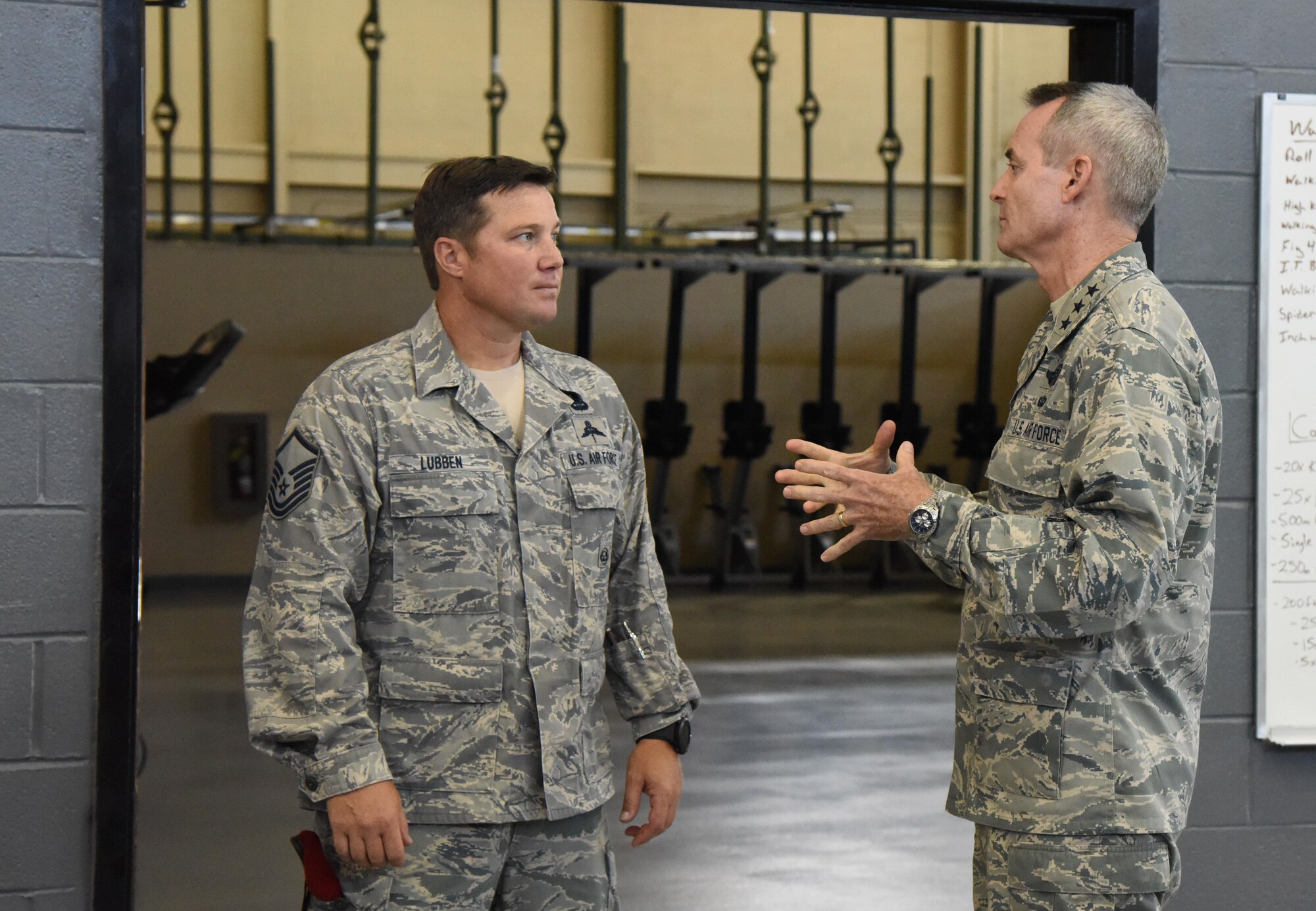 Lt. Gen. Darryl Roberson, commander of Air Education and Training Command, speaks to Master Sgt. Richard Lubben, 352nd Battlefield Airmen Training Squadron superintendent, while touring the Matero Hall Fitness Center July 19, 2017, at Keesler Air Force Base, Miss. (U.S. Air Force photo by Kemberly Groue)
