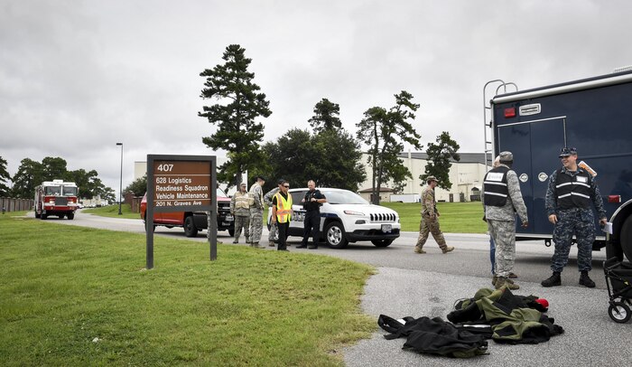 Joint Base Charleston emergency management members respond to the scene of a suspicious package training scenario during an anti-terrorism exercise here, Aug. 9, 2017. After responding to the scenario, the 628th Civil Engineer Squadron explosive ordnance disposal flight was tasked to further investigate the simulated package as part of the exercise.