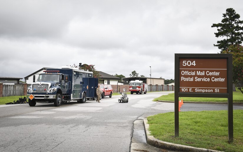 Joint Base Charleston emergency management personnel respond to a suspicious package scenario during an anti-terrorism exercise here, Aug. 9, 2017. Members responded to the scene and tasked 628th Civil Engineer Squadron explosive ordnance disposal flight to further investigate the package as part of the exercise