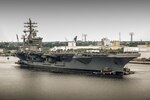 The aircraft carrier USS Dwight D. Eisenhower (CVN 69) transits the Elizabeth River.
