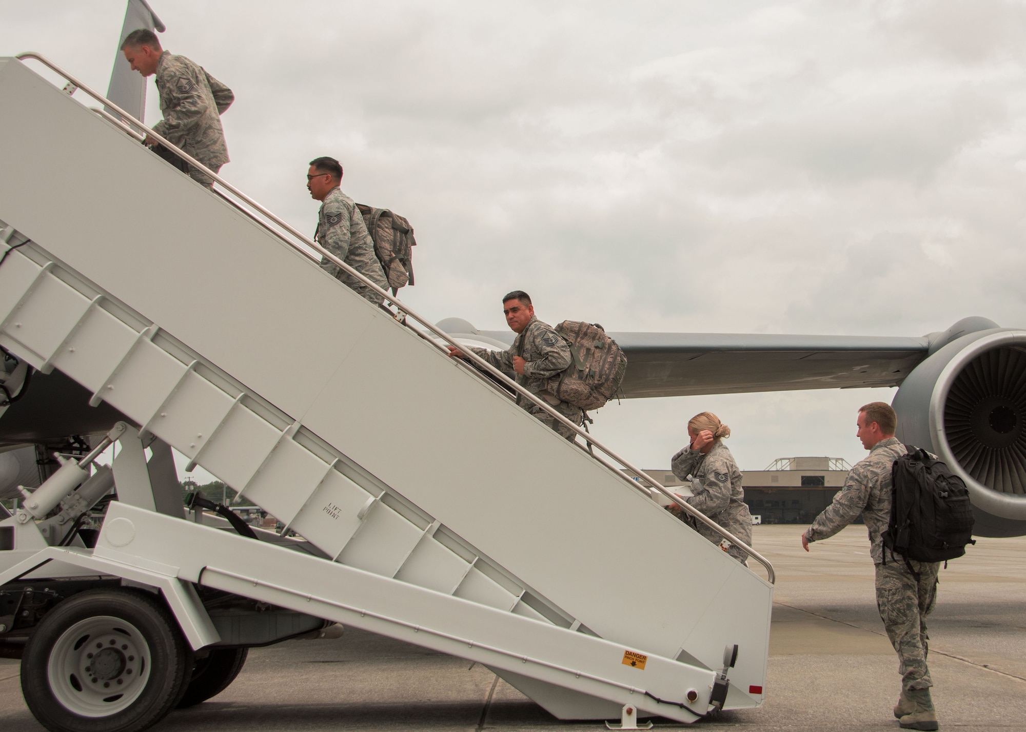 Airmen participating in the Patriot Warrior Exercise board a KC-135 Stratotanker at Dobbins Air Reserve Base, Ga. Aug. 7, 2017. The Airmen arrived at Dobbins from a variety of units around Air Force Reserve Command before receiving orders to deploy to the exercise frontlines. (U.S. Air Force photo/Staff Sgt. Andrew Park)