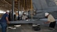309th Aerospace Maintenance and Regeneration Group mechanics carefully place a removed stabilator from an F/A-18C Hornet at Davis-Monthan AFB, Ariz., on June 6, 2016, onto a transport cart as part of the preparation to transport the aircraft to a Boeing maintenance facility at Cecil Airport, Jacksonville, Fla.