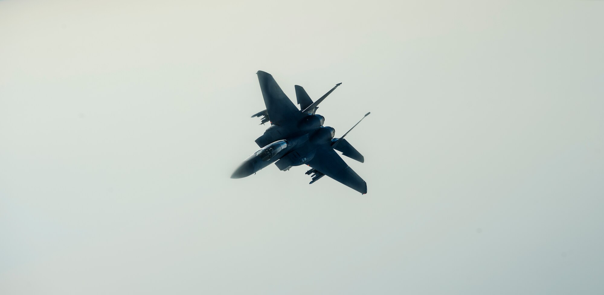 A U.S. Air Force F-15E Strike Eagle breaks off after receiving fuel from a KC-135 Stratotanker from the 349th Air Refueling Squadron, McConnell Air Force Base, Kan., during Exercise Mobility Guardian while flying over Yakima, Wash., Aug. 3, 2017.