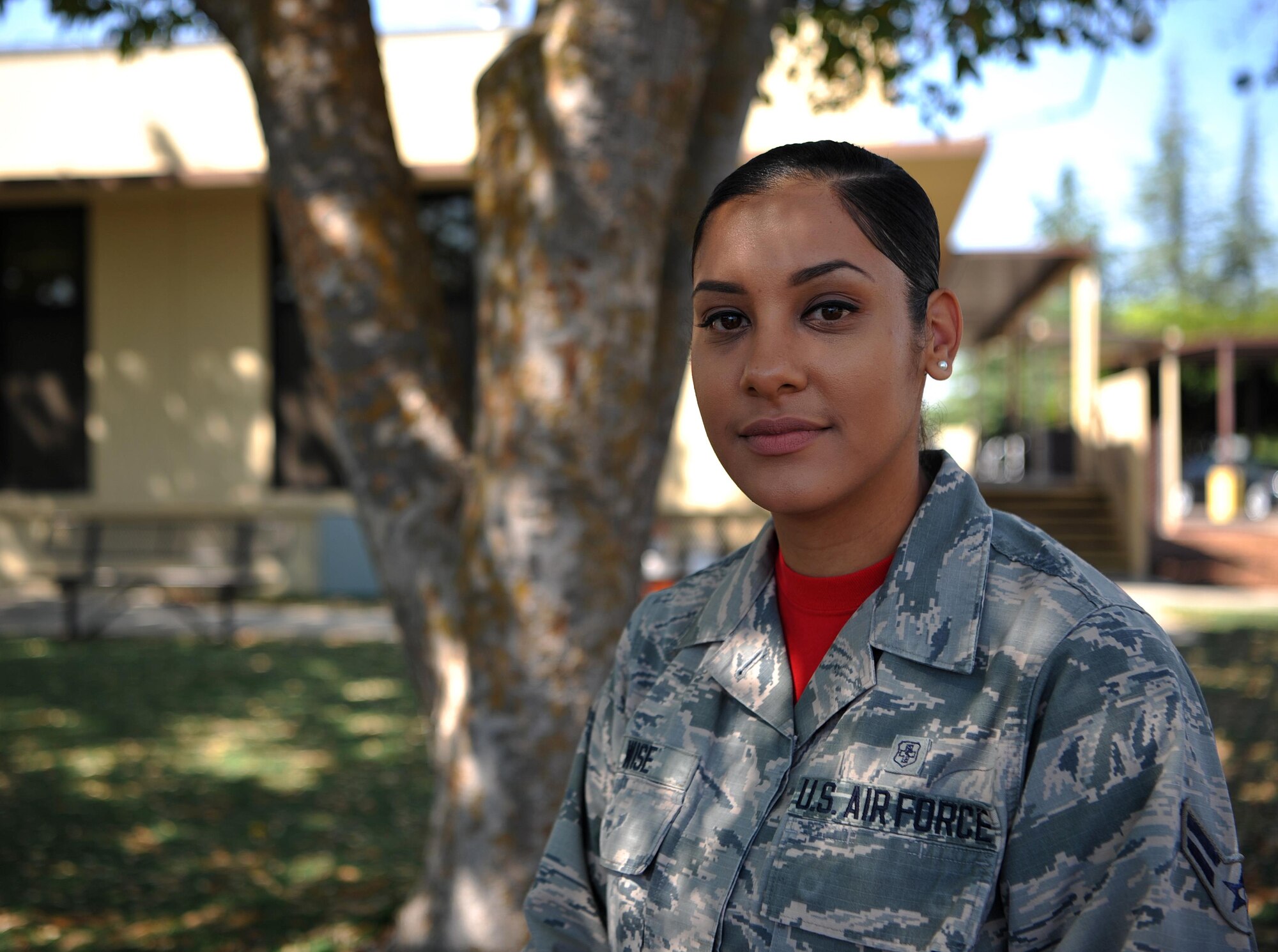 Airman 1st Class Regina Wise, 9th Medical Operations Squadron pediatric medical technician, poses for a photo.