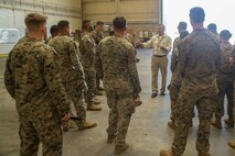 Marines tour the depot-level maintenance facility at Marine Corps Support Facility Blount Island, Fla., Aug. 10, 2017.