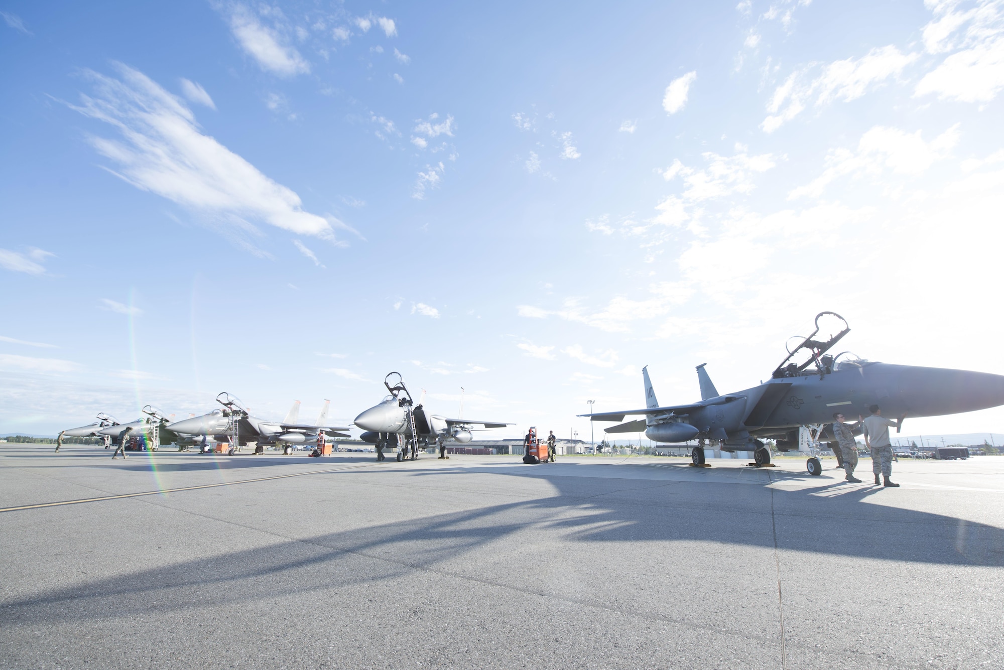 F-15E Strike Eagles belonging to the 391st Fighter Squadron sit on the flightline at Eielson Air Force Base, Idaho, August 8, 2017. Airmen from the 391st from Mountain Home Air Force Base, Idaho demonstrate their tactical prowess during Red Flag Alaska 17-3. (U.S. Air Force photo by Senior Airman Malissa Armstrong/Released)