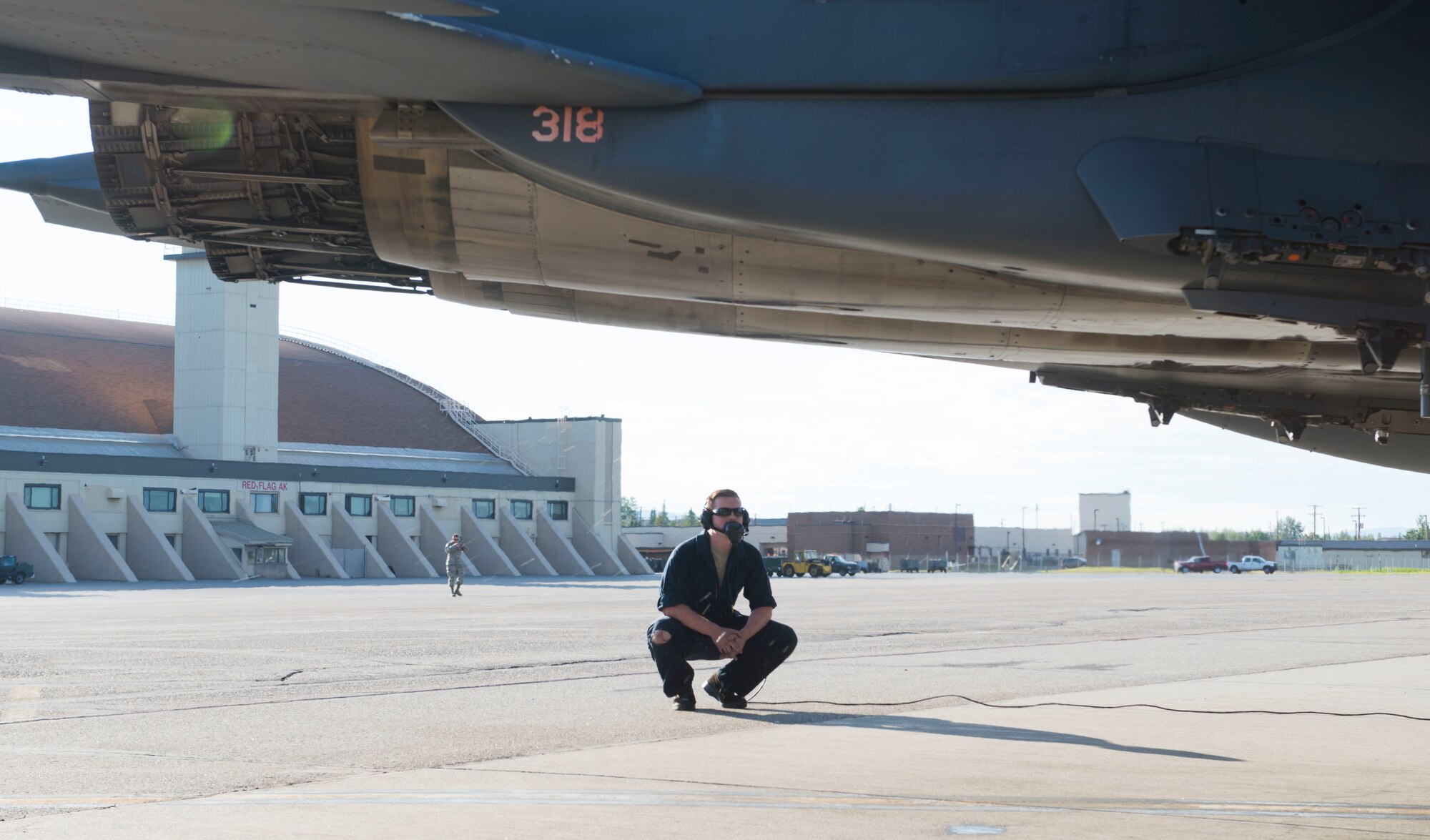 An airman prepares an 391st Fighter Squadron F-15E Strike Eagle for take-off, August 8, 2017, at Eielson Air Force Base, Idaho. Airmen from the 391st from Mountain Home Air Force Base, Idaho demonstrate their tactical prowess during Red Flag Alaska 17-3. (U.S. Air Force photo by Senior Airman Malissa Armstrong/Released)