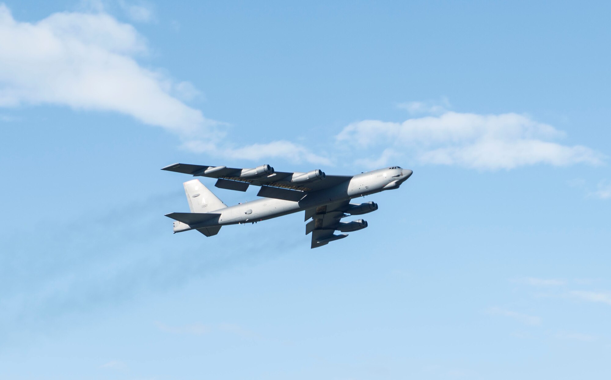 A B-52 Bomber flies over an Eielson Air Force Base, Idaho, August 8, 2017. Airmen from the 391st from Mountain Home Air Force Base, Idaho demonstrate their tactical prowess during Red Flag Alaska 17-3. (U.S. Air Force photo by Senior Airman Malissa Armstrong/Released)