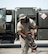 U.S Air Force Tech. Sgt. Jason Johnson, a fuels specialist with the 379th Expeditionary Logistics Readiness Squadron, Fuels Management Flight, carries a fuel hose at Al Udeid Air Base, Qatar, July 24, 2017.  As a fuels specialist, Johnson is responsible for operating the vehicle, equipment and storage facilities that are vital to the refueling process and ensuring that all safety regulations are being followed.  (U.S. Air Force photo by Tech. Sgt. Amy M. Lovgren)