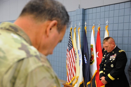 Maj. Gen. Troy D. Kok, commanding general of the U.S. Army Reserve’s 99th Regional Support Command, pauses for the benediction during the command’s ribbon-cutting ceremony Aug. 13 for the Staff Sgt. Jonah E. Kelley Army Reserve Center on Joint Base McGuire-Dix-Lakehurst, New Jersey. The center underwent a $13.5 million full-facility revitalization, allowing Soldiers to train in an up-to-date, energy-efficient facility that represents the next step toward ensuring America’s Army Reserve remain the most capable, combat-ready and lethal federal reserve force in the history of the nation.